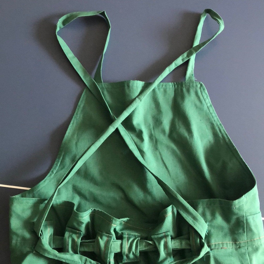 Homemade embroidered apron dress